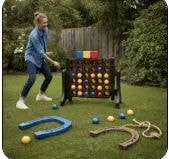 Yard games set including giant Connect Four, horseshoes, and bocce ball on a lawn