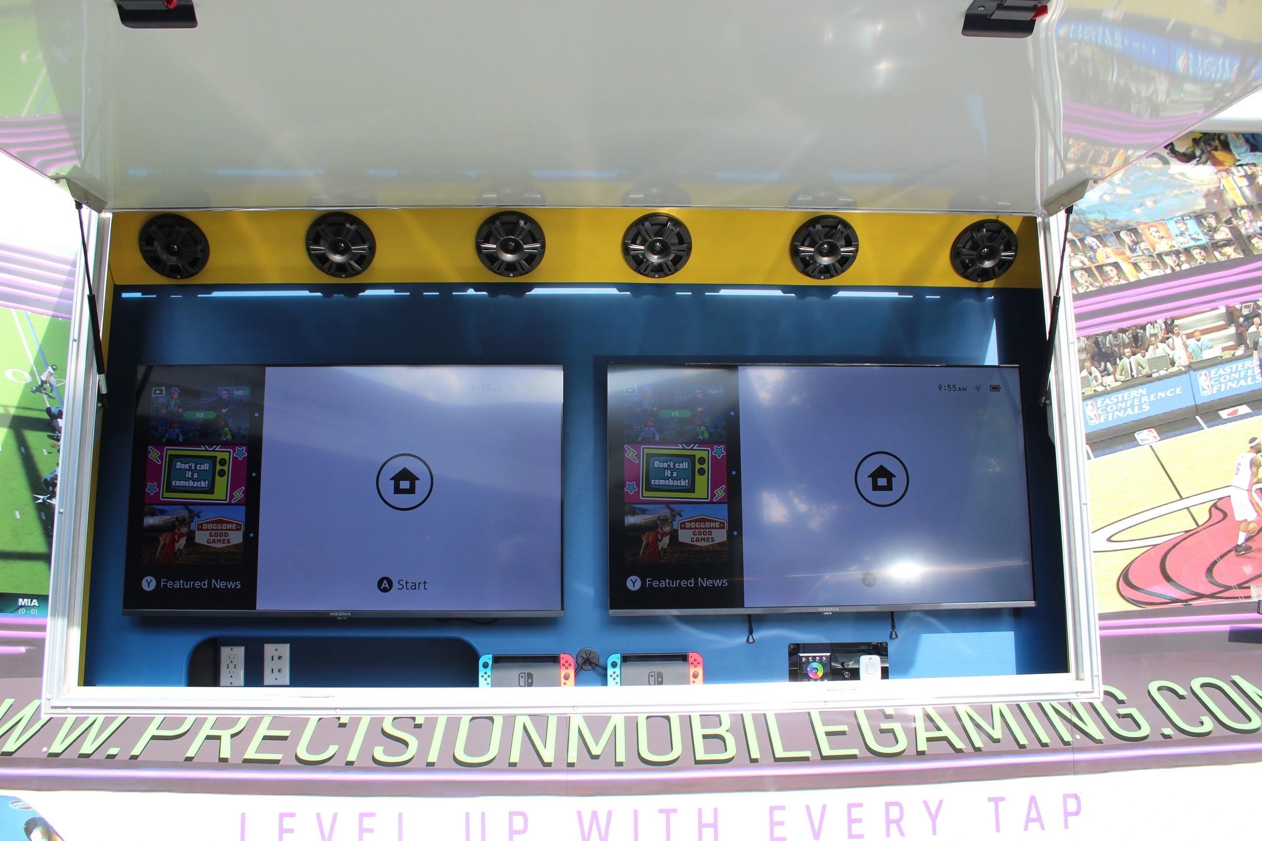 Precision Mobile Gaming truck exterior screens open at an event